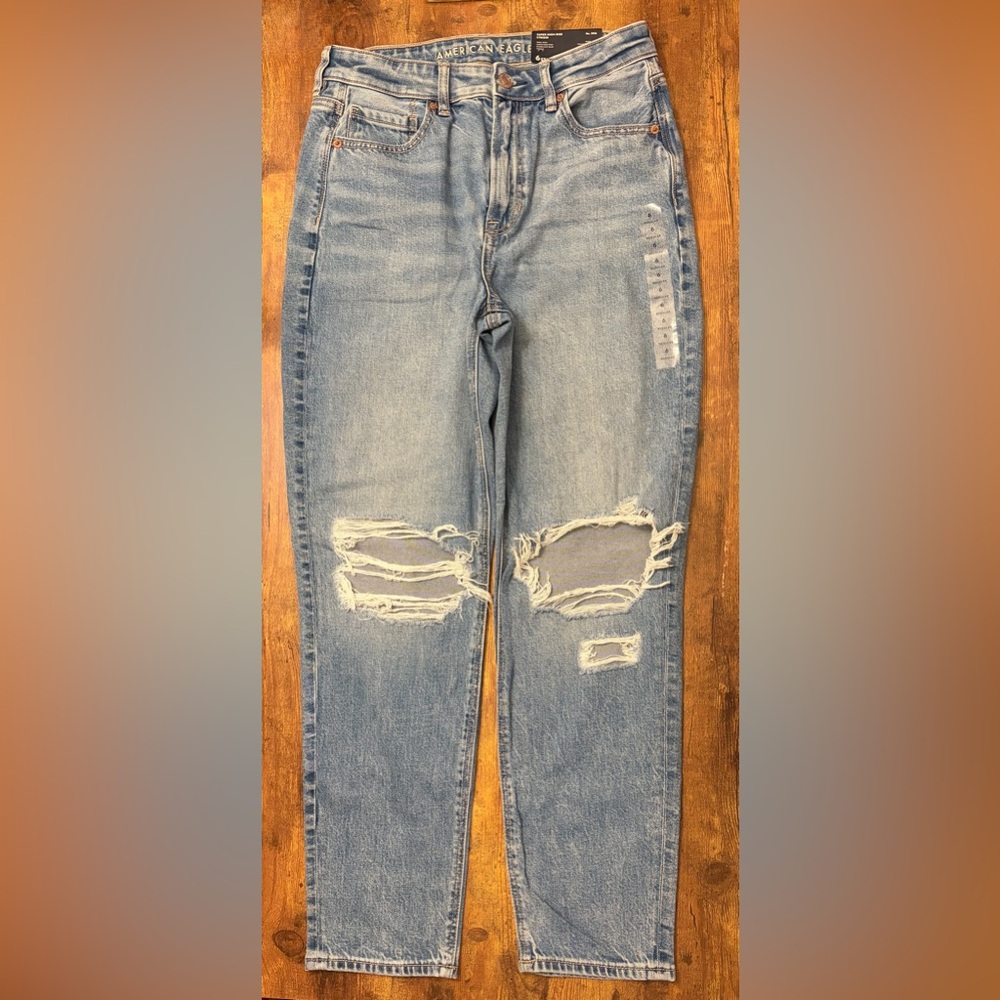 NWT American Eagle Strigid Ripped Mom Jeans in color-blown-out blue shade. - Picture 2 of 8